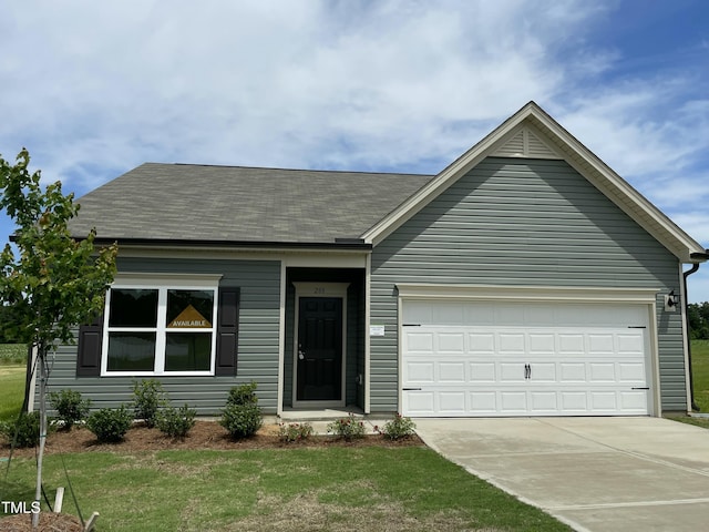 288 Olivia Crossing Ct Unit 10, Four Oaks, NC 27524 - view of front facade featuring driveway, a front yard, a garage, and roof with shingles
