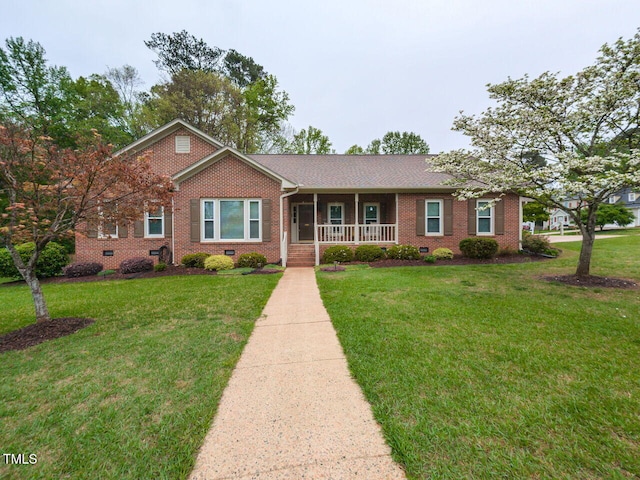 422 Old Scarborough Ln, Garner, NC 27529 - ranch-style home with brick siding, crawl space, and a front lawn