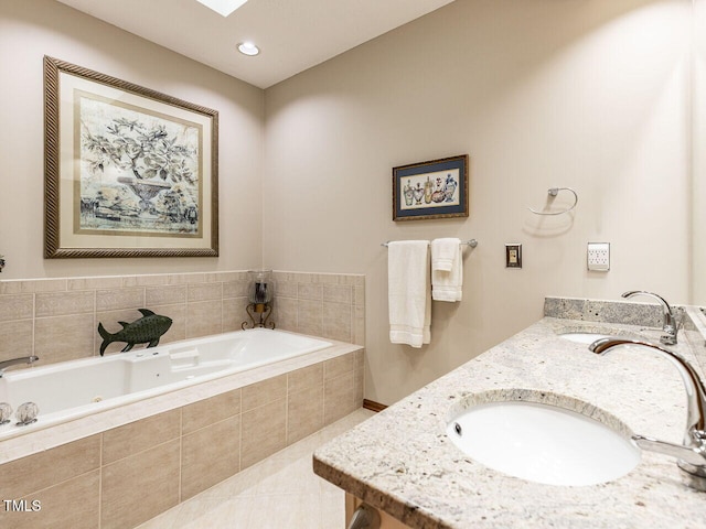 422 Old Scarborough Ln, Garner, NC 27529 - bathroom with a sink, tile patterned floors, and a tub with jets