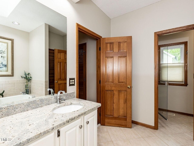 422 Old Scarborough Ln, Garner, NC 27529 - full bath featuring vanity and baseboards