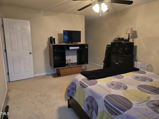 4610 Miller Dr, Durham, NC 27704 - bedroom with baseboards, light colored carpet, and ceiling fan