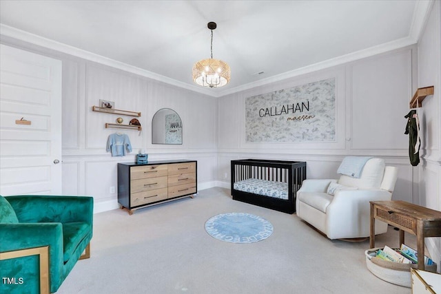bedroom featuring a decorative wall and carpet floors