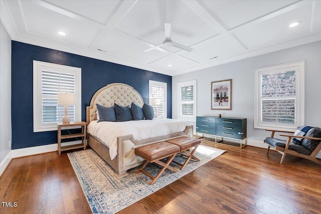 bedroom with baseboards, recessed lighting, crown molding, coffered ceiling, and wood finished floors