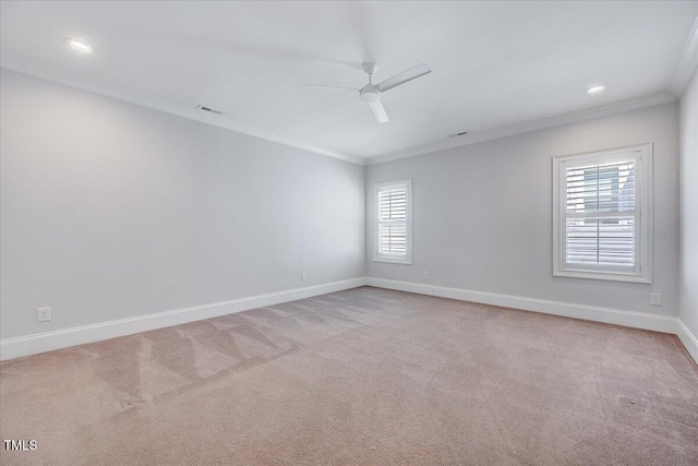 unfurnished room with baseboards, recessed lighting, crown molding, a ceiling fan, and carpet