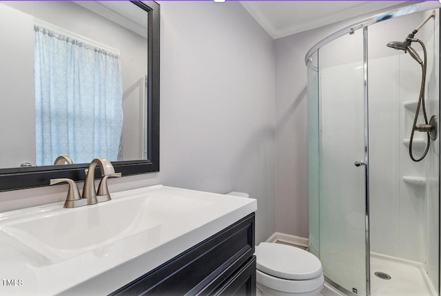 1813 Grady Dr, Durham, NC 27712 - bathroom with a shower stall, toilet, vanity, and ornamental molding