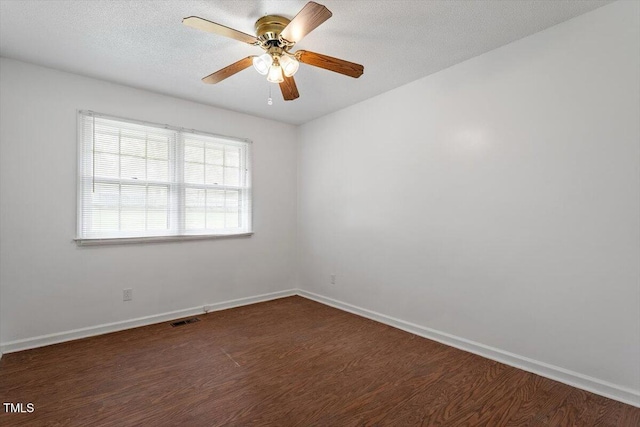 1813 Grady Dr, Durham, NC 27712 - empty room featuring dark wood-style flooring and ceiling fan