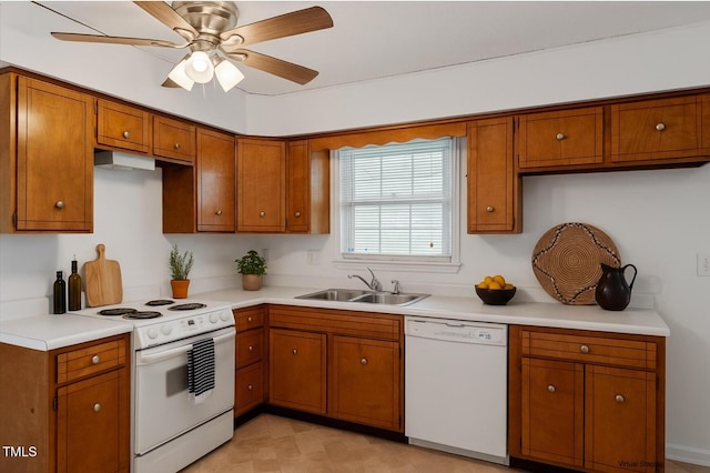 1813 Grady Dr, Durham, NC 27712 - kitchen featuring white appliances, brown cabinetry, light countertops, a ceiling fan, and exhaust hood