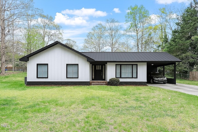 1813 Grady Dr, Durham, NC 27712 - modern inspired farmhouse with concrete driveway, a carport, and a metal roof