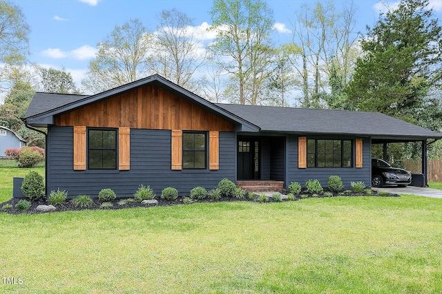 1813 Grady Dr, Durham, NC 27712 - view of front of property featuring a carport and a front yard