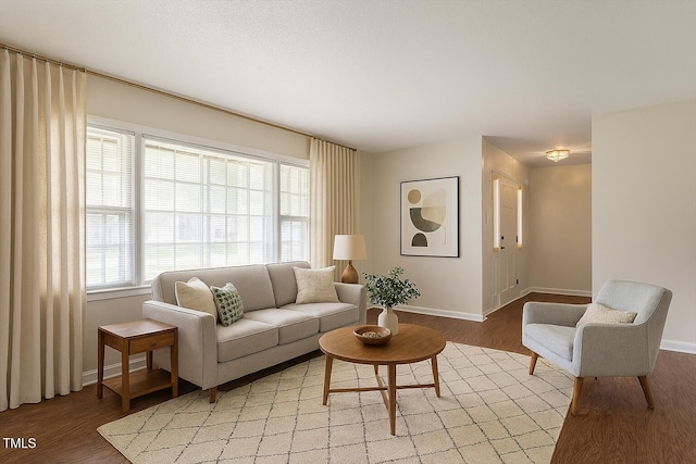 1813 Grady Dr, Durham, NC 27712 - living area featuring light wood-style flooring and baseboards