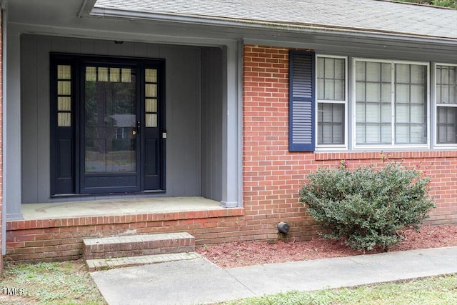 1813 Grady Dr, Durham, NC 27712 - entrance to property featuring brick siding and roof with shingles
