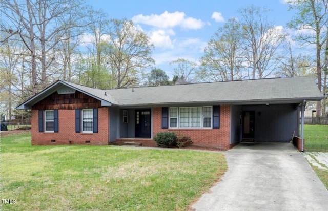 1813 Grady Dr, Durham, NC 27712 - ranch-style home featuring crawl space, driveway, brick siding, and a carport