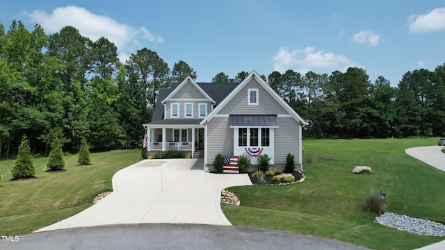 6521 Camellia Creek Dr, Raleigh, NC 27603 - craftsman house with covered porch, a front yard, and concrete driveway