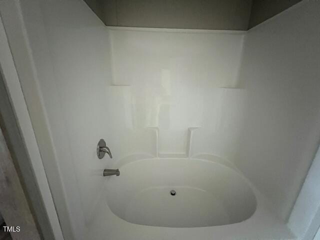 room details with a bath and a shower
