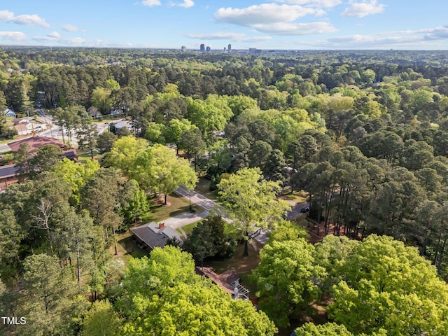 aerial view featuring a view of trees