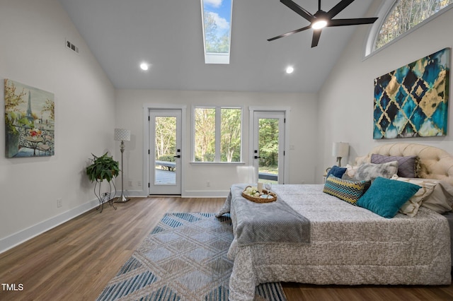 bedroom featuring high vaulted ceiling, access to outside, multiple windows, and visible vents