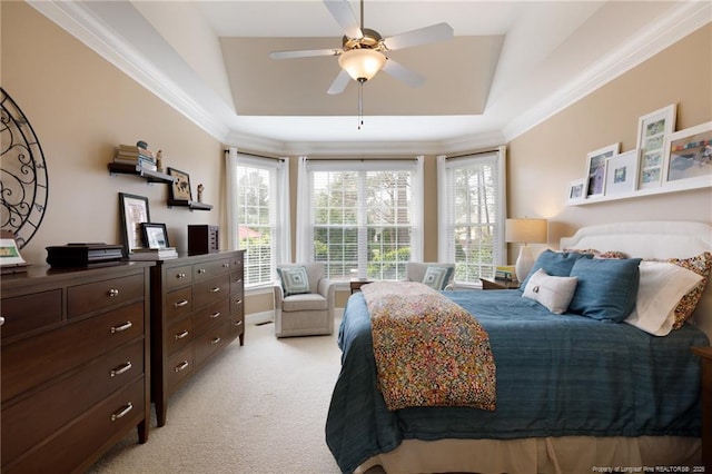 308 St Martins Pl, Fayetteville, NC 28311 - bedroom featuring a tray ceiling, light colored carpet, ceiling fan, and ornamental molding