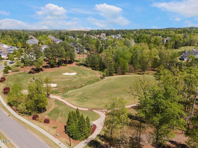 aerial view of residential area with a golf course