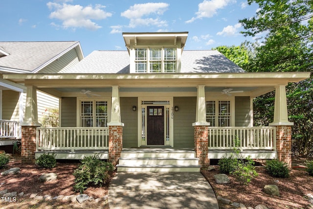 2106 Cloud Cover Ln, Raleigh, NC 27614 - craftsman-style house featuring a ceiling fan, a shingled roof, and covered porch
