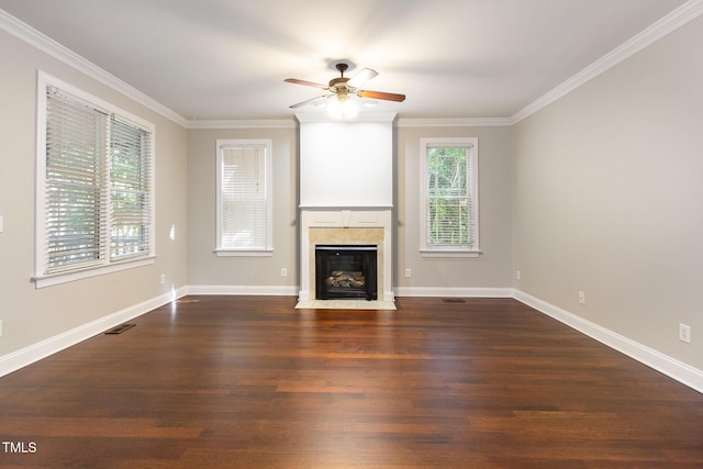 2106 Cloud Cover Ln, Raleigh, NC 27614 - unfurnished living room featuring a fireplace with flush hearth, wood finished floors, visible vents, crown molding, and ceiling fan