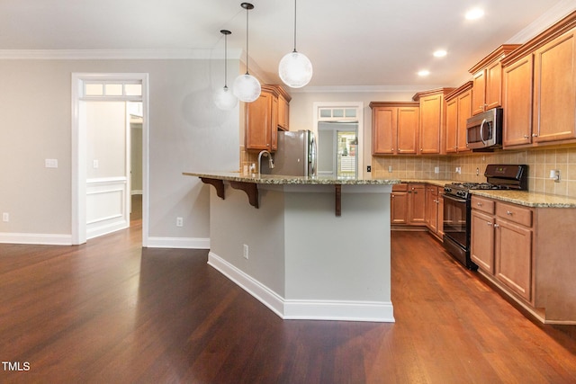 2106 Cloud Cover Ln, Raleigh, NC 27614 - kitchen featuring a kitchen breakfast bar, light stone counters, dark wood-style floors, a peninsula, and appliances with stainless steel finishes
