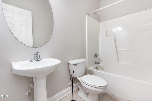 2106 Cloud Cover Ln, Raleigh, NC 27614 - bathroom with tile patterned floors, baseboards, tub / shower combination, and toilet