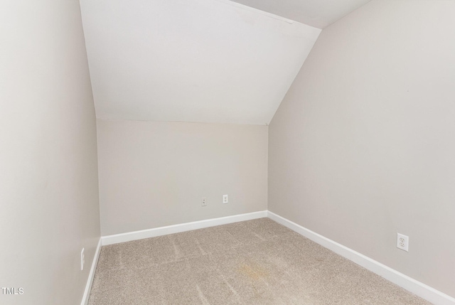 2106 Cloud Cover Ln, Raleigh, NC 27614 - bonus room with lofted ceiling, baseboards, and light colored carpet