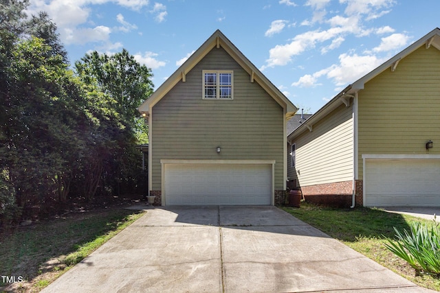 2106 Cloud Cover Ln, Raleigh, NC 27614 - view of front of house featuring driveway and a garage