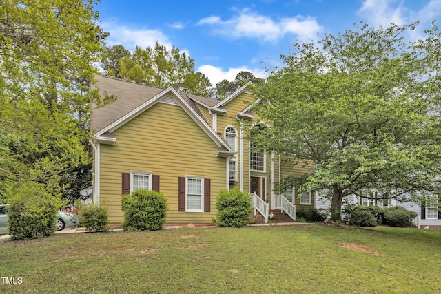 9332 Leslieshire Dr, Raleigh, NC 27615 - view of front of house featuring a front yard