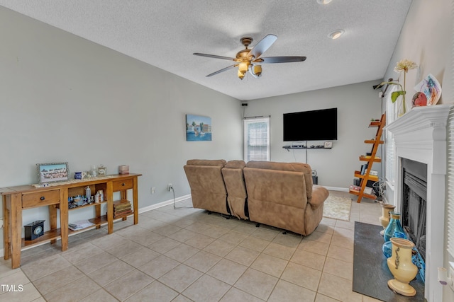 9332 Leslieshire Dr, Raleigh, NC 27615 - living area with baseboards, a textured ceiling, light tile patterned flooring, and ceiling fan
