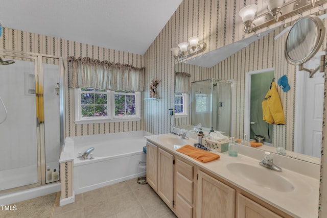 9332 Leslieshire Dr, Raleigh, NC 27615 - full bath with a stall shower, wallpapered walls, a sink, and lofted ceiling