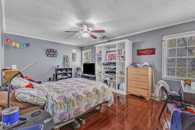 9332 Leslieshire Dr, Raleigh, NC 27615 - bedroom with a textured ceiling, crown molding, a ceiling fan, and wood finished floors