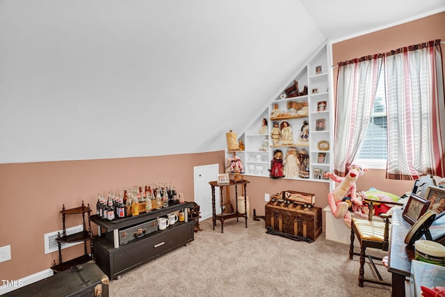 playroom with vaulted ceiling, visible vents, carpet, and built in shelves