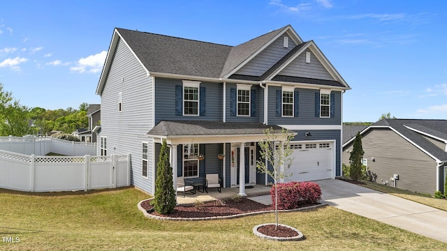 traditional-style home featuring covered porch, a garage, driveway, and roof with shingles