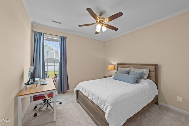 bedroom featuring light carpet, baseboards, crown molding, an office area, and ceiling fan