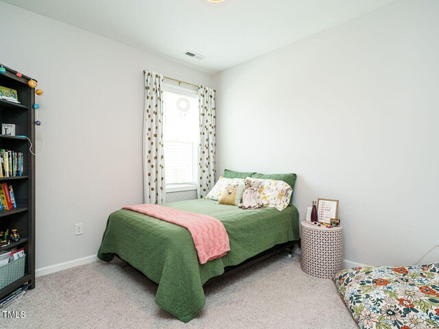 140 Clear Water Rd, Louisburg, NC 27549 - carpeted bedroom with visible vents and baseboards