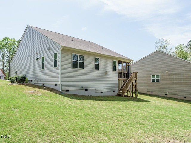 140 Clear Water Rd, Louisburg, NC 27549 - back of property featuring a deck, stairway, a lawn, and crawl space