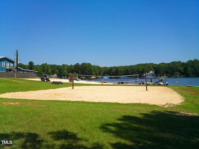 140 Clear Water Rd, Louisburg, NC 27549 - view of home's community with a wooded view, volleyball court, and a lawn