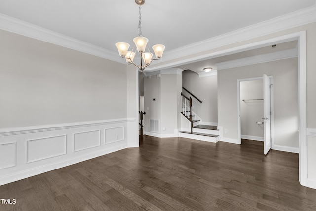 unfurnished dining area with dark wood-style flooring, a chandelier, crown molding, stairs, and arched walkways