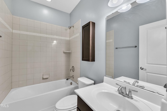 full bath with toilet, shower / bathtub combination, and vanity