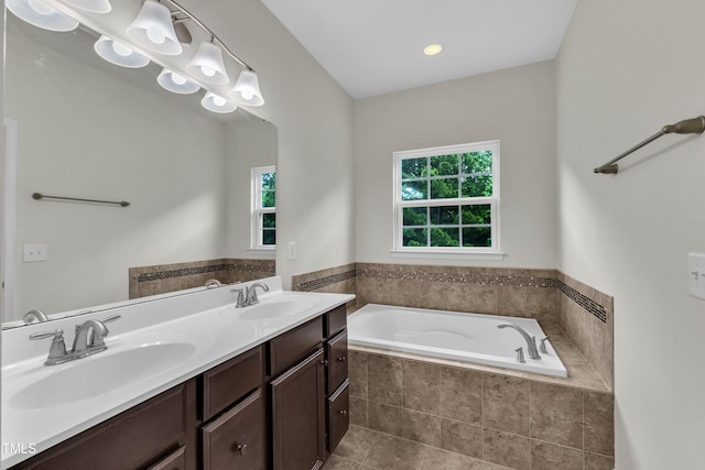 full bathroom with a garden tub and double vanity