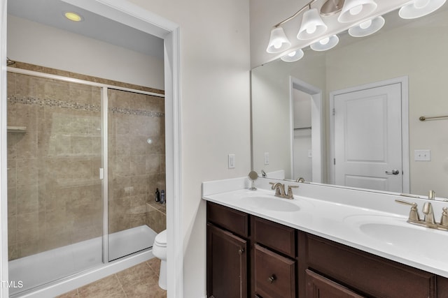 full bathroom with toilet, a stall shower, double vanity, and tile patterned flooring