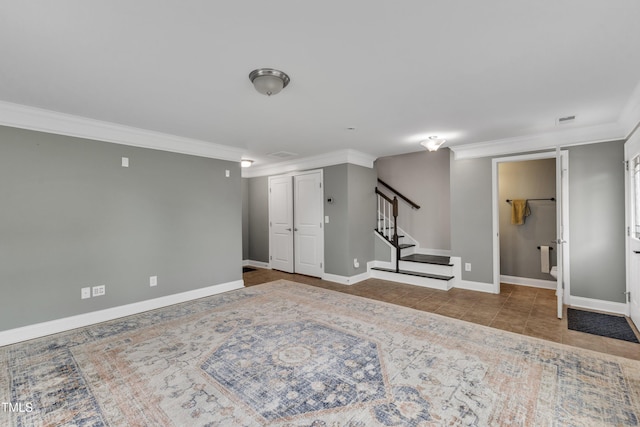 basement featuring crown molding, stairway, baseboards, and tile patterned floors
