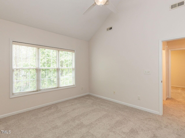 unfurnished room with a ceiling fan, visible vents, and carpet flooring