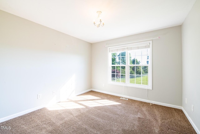 78 Cross Creek Ct, Timberlake, NC 27583 - carpeted empty room with a chandelier and baseboards