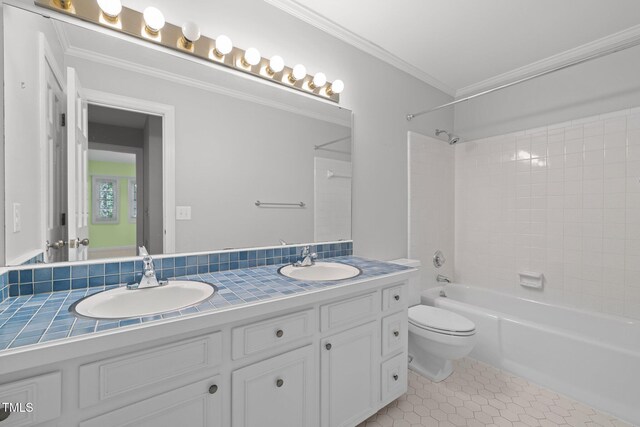 1304 Deboy St, Raleigh, NC 27606 - full bathroom with a sink, washtub / shower combination, double vanity, and crown molding