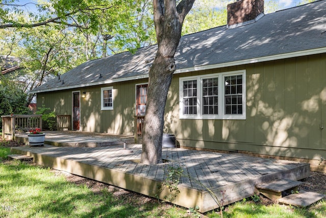 1304 Deboy St, Raleigh, NC 27606 - back of property featuring a chimney and a deck