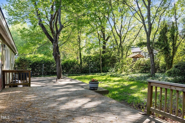 1304 Deboy St, Raleigh, NC 27606 - wooden terrace featuring a yard