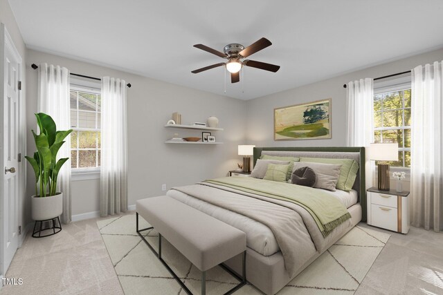 1304 Deboy St, Raleigh, NC 27606 - bedroom featuring light carpet, ceiling fan, baseboards, and multiple windows