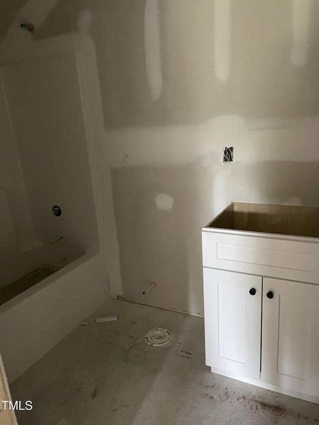 bathroom with a bathtub and a shower